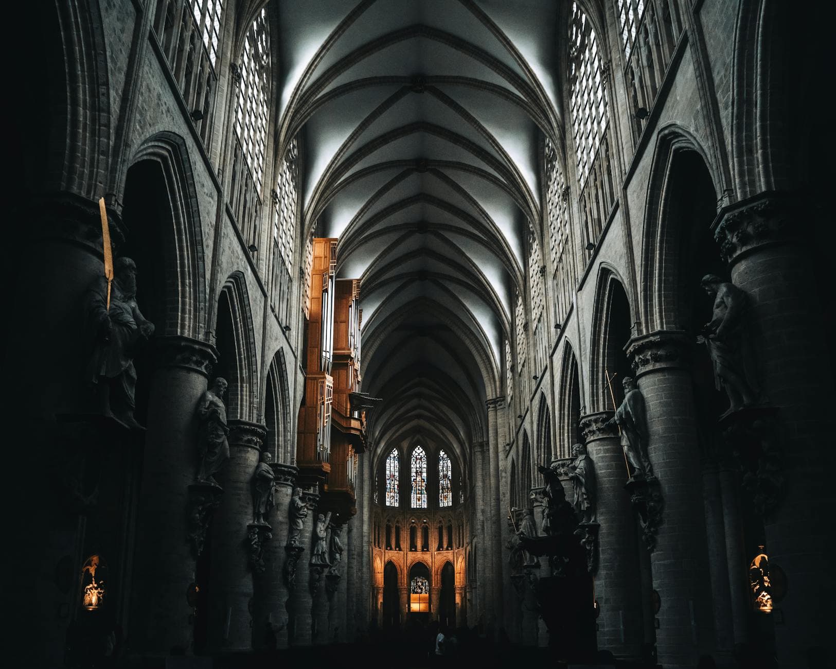 Interior view of the stunning Gothic architecture inside Brussels Cathedral, Belgium.