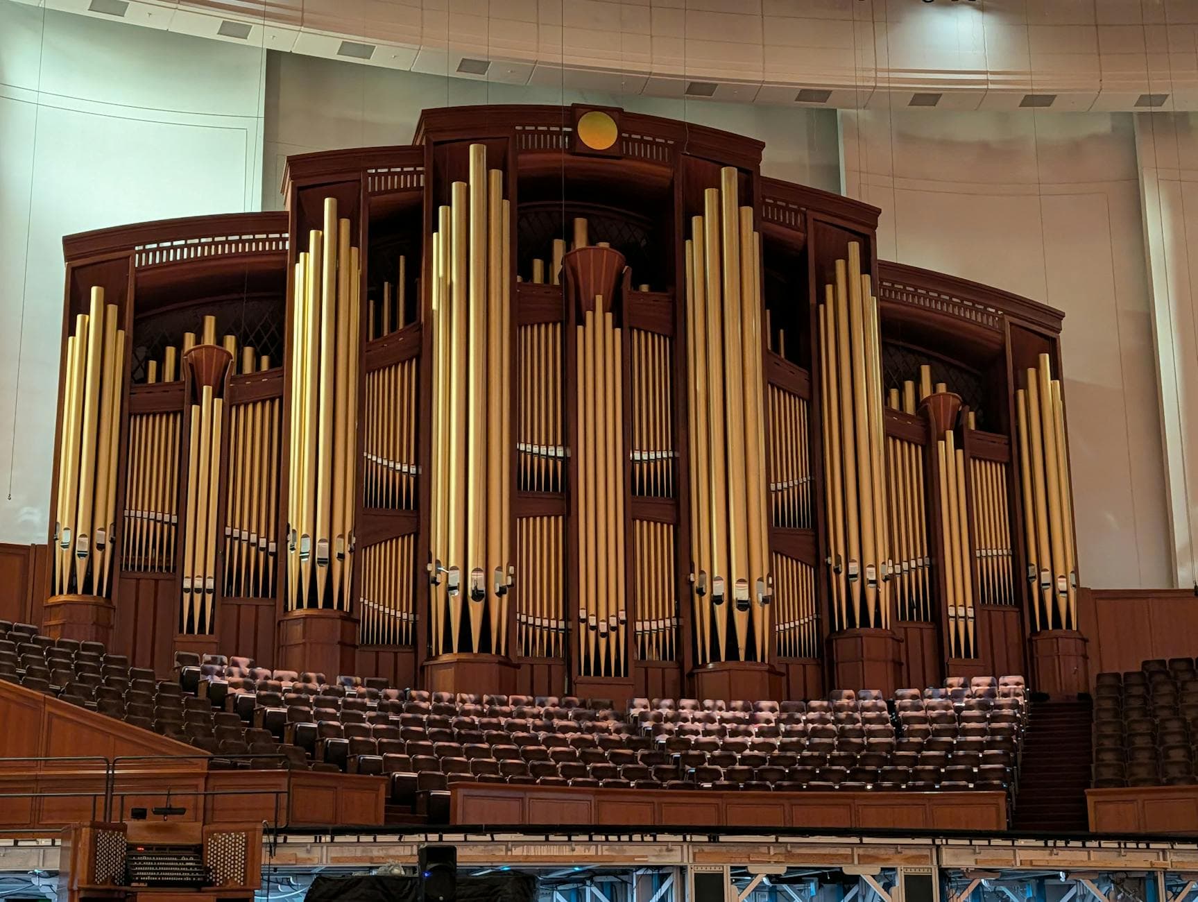 A grand pipe organ inside a concert hall in Salt Lake City, showcasing its stunning architecture.